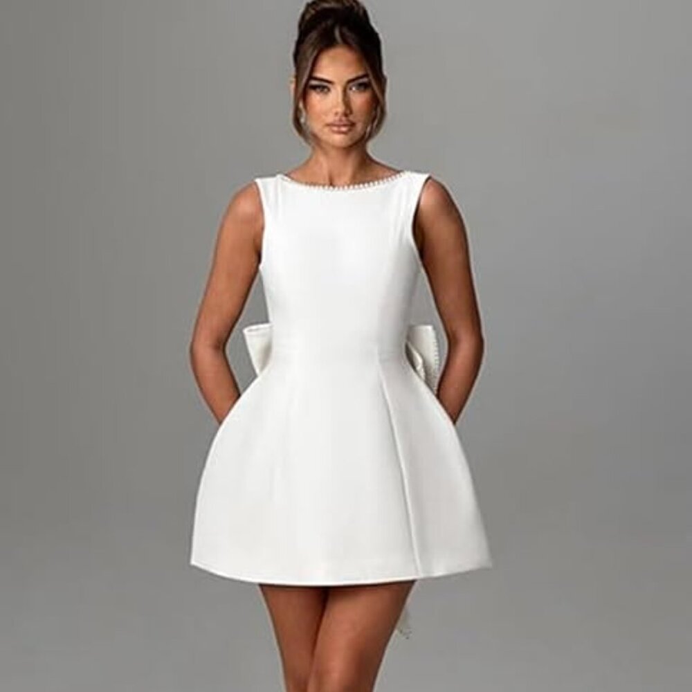 Elegant White Mini Dress with Bow Detail